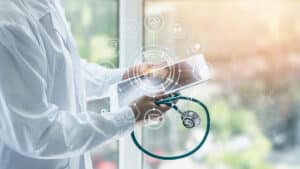 Healthcare professional using digital interface representing ai local seo and data-driven local optimization